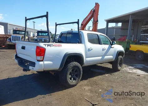 2018 Toyota Tacoma Trd Off Road z USA, uszkodzony, nr VIN 3TMCZ5AN9JM153498